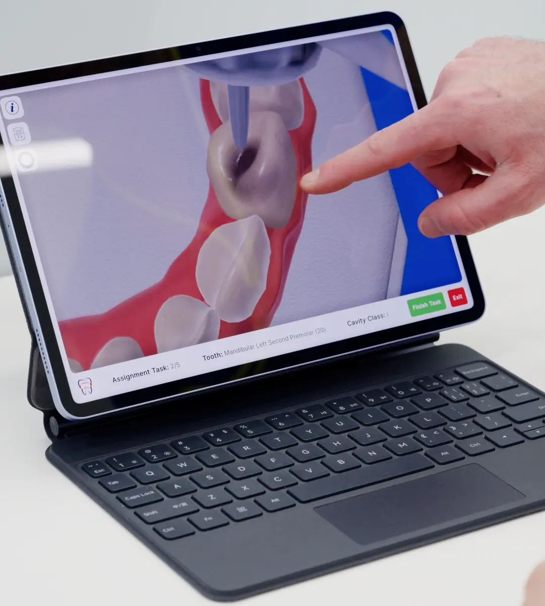 Instructor monitoring a live DentiXR student session on an external tablet